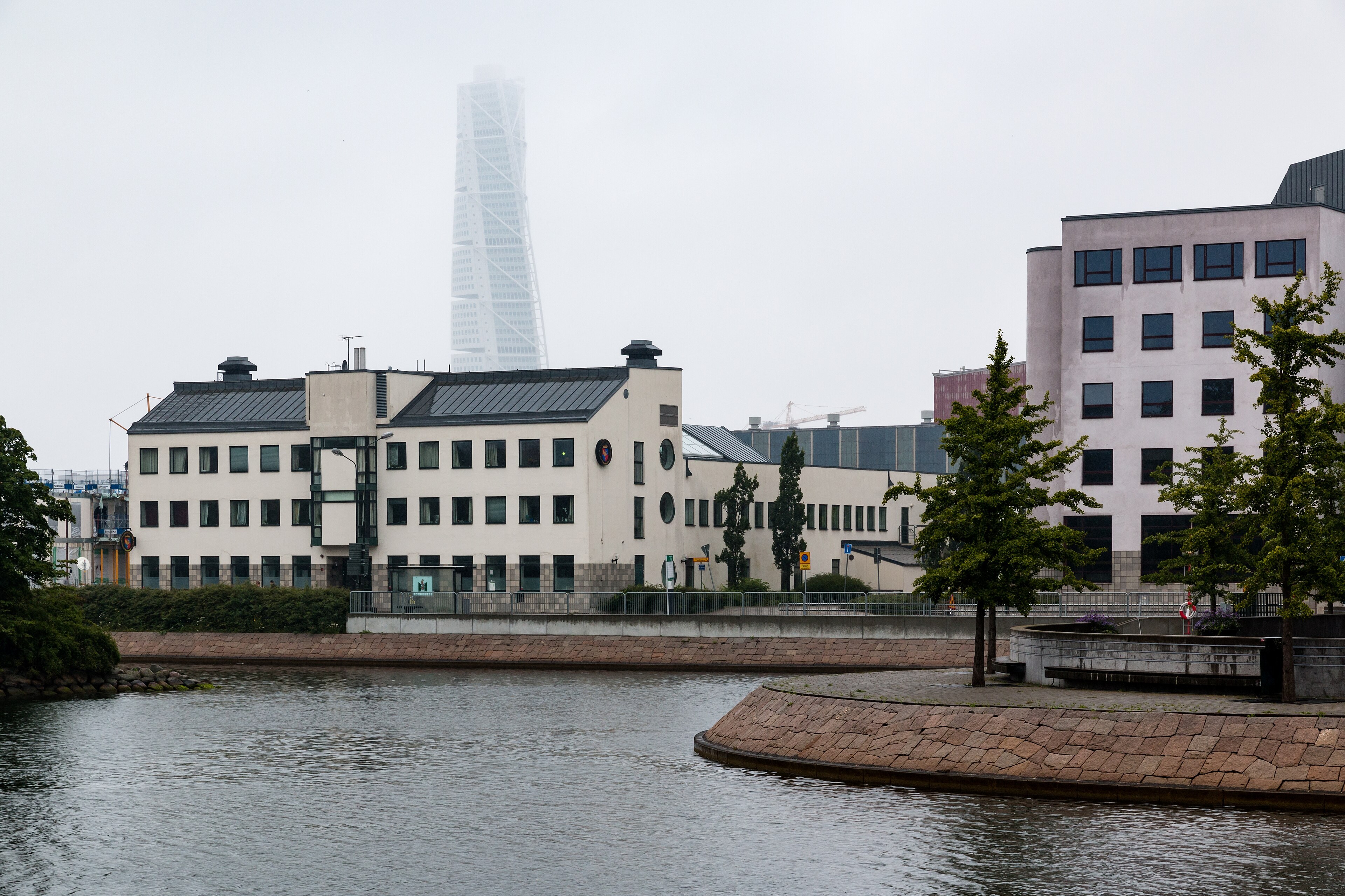 Turning Torso rising over Malmö, seen from the streets of the city